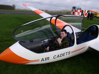 A cadet returns from a glider flight with the Air Cadets